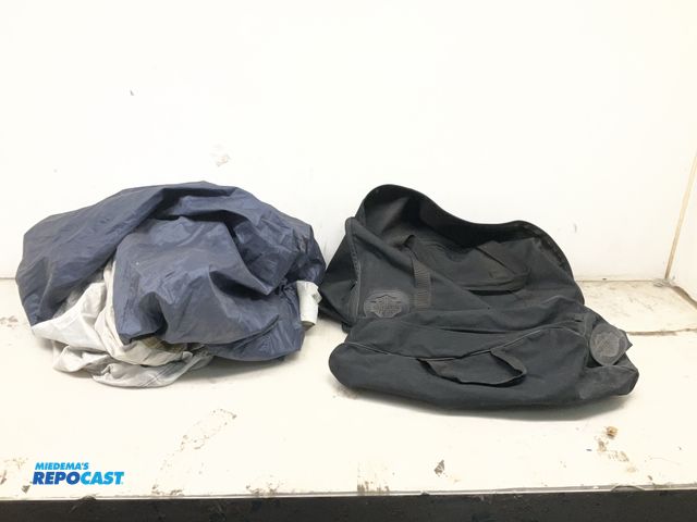 Lot 2-74183 - Lot of (2) Harley Davidson Fabric Zip-Up Duffle Bags, and (1) Misc. Blue and White Fabric Motorcycle...