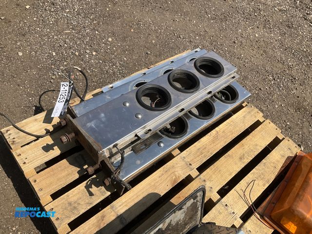 Lot 2-11253 - (3) stainless steel mudflap brackets with cutouts for lights, 30”L x 6-3/8” x 2-3/8” each, used