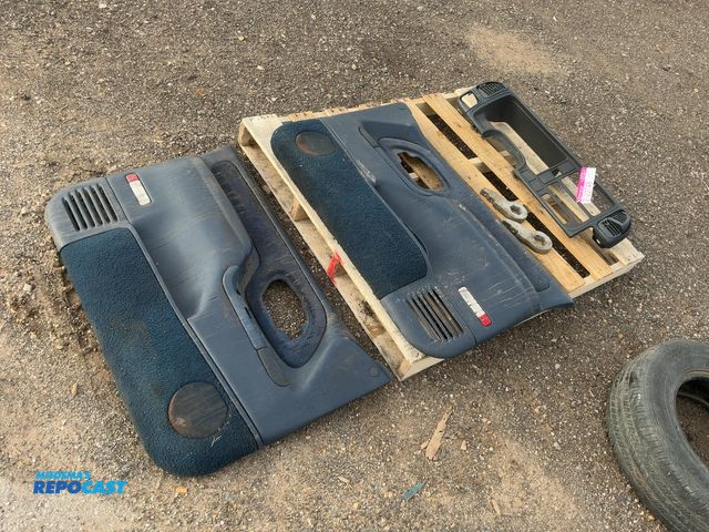 Lot 2-22746 - Lot of (2) Interior Door Panels, (1) Dash Panel for by Gauges, and (2) Torsion Lift Keys for approx....