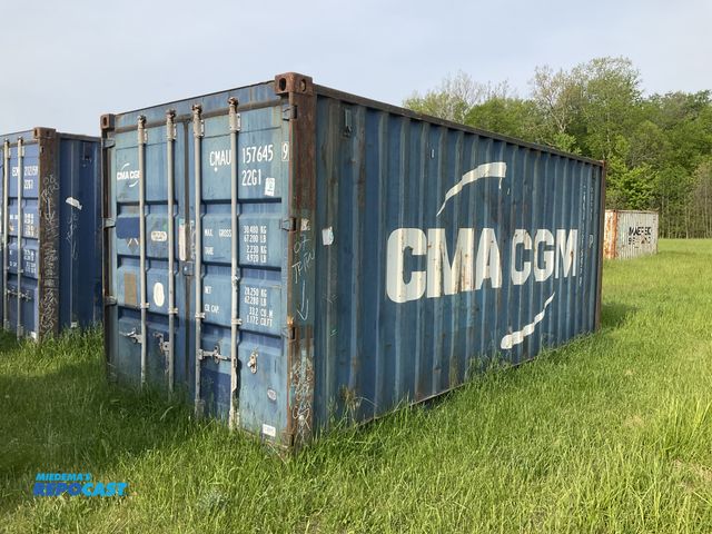 Lot 2-22062 - 20’ Shipping / Storage Container 8’ wide x 8’ 6” tall, swing doors on one end, wood deck, rings for ...