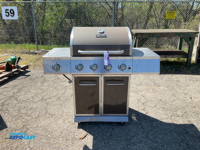 Lot 2-35689 - Dyna-Glo DGE Series 4-burner propane gas grill with a side burner