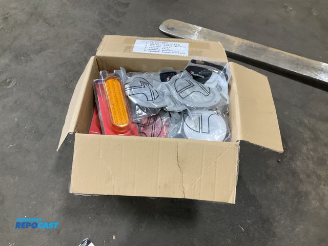Lot 2-11335 - Box of assorted lights including (4) clear 4” LED p/n 44344C, (5) Amber mid turn signals p/n 60215Y3...