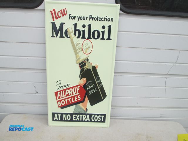 Lot 2-56918 - Mobil Oil Embossed metal bottles sign - approx.. 15" x 29"