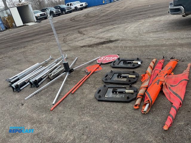 Lot 2-72705 - 1 Lot of road construction signs, single spring stands and rubber base stands