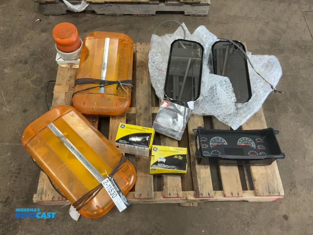 Lot 2-11530 - Lot of (2) Haldex Mirrors, (1) Used Volvo Instrument Cluster, (2) Halogen H4656 Bulbs, (1) Exhaust C...