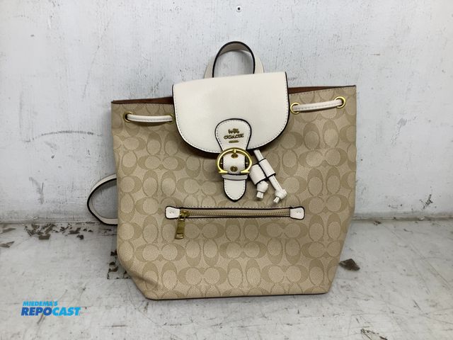 Lot 2-75985 - New Coach Kleo drawstring backpack, signature logo canvas paired with white leather flap and trim