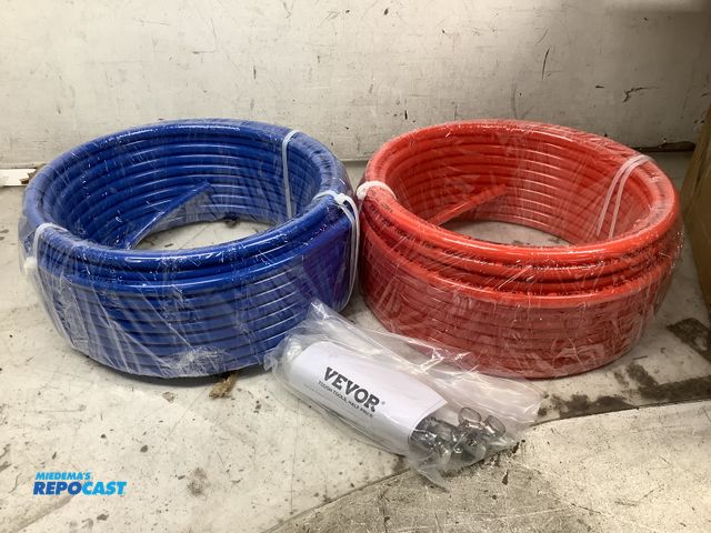 Lot 2-27747 - Lot of (2) coils of pipe, both measure 100’.