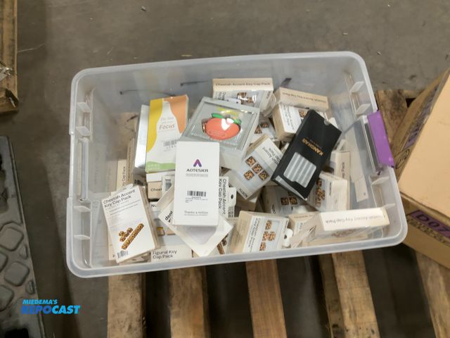 Lot 2-35669 - Lot of various accessories including cheetah accent key cap packs, peach ear bud case covers, phone ...
