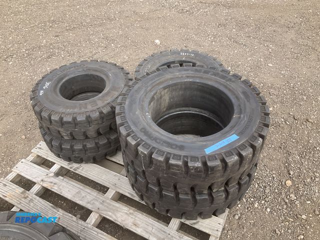 Lot 2-22987 - Lot of forklift tires including: (1) 28x9-15 pneumatic tire, (2) 28x9-15 solid tires, and (2) 6.50-1...