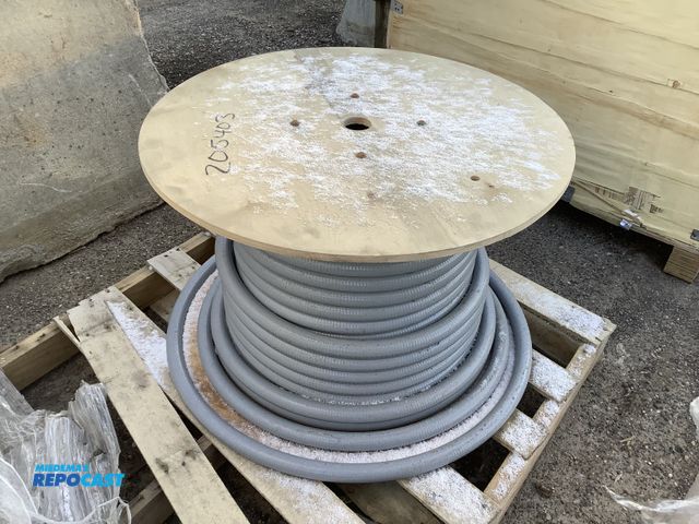 Lot 2-73159 - Large wooden spool with electrical insulated tubing