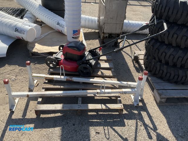 Lot 2-67886 - Skid lot of 40 volt Li-Ion power smart electric mower and a par of weather guard ladder holding rack...