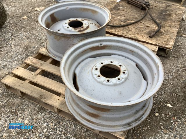 Lot 2-15599 - (2) rear tractor wheels in original condition. Have been sand blasted and are in grey primer paint. ...