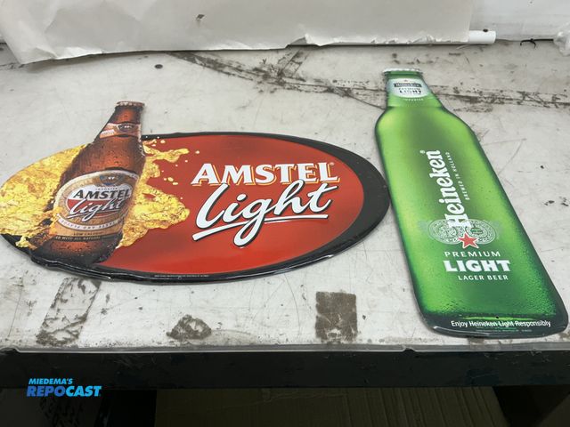 Lot 2-96644 - (2) beer signs Heineken and Amstel light.