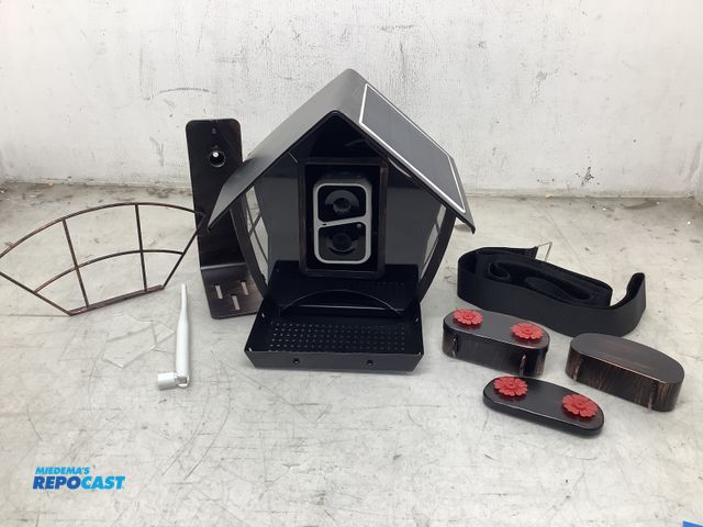Lot 2-99693 - bird feeder (brown/black) with AI powered smart security cam (white) and integrated solar panel