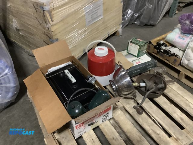 Lot 2-35039 - Lot of various camping items including a Weber propane grill, cast iron pots, Coleman jug, and more