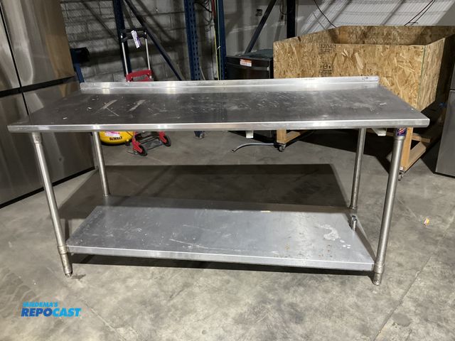 Lot 2-55094 - Stainless Steel John Boos 72” width x 36” height x 30” depth stainless steel prep table. (2-feet nee...