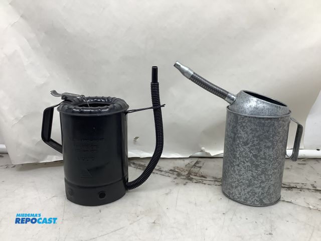 Lot 2-91041 - Lot of (2) metal oil dispensing cans