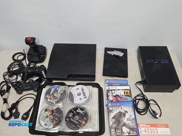 Lot 2-40304 - SONY PlayStation video game consoles and parts. Said to have been running /used when put away, but h...