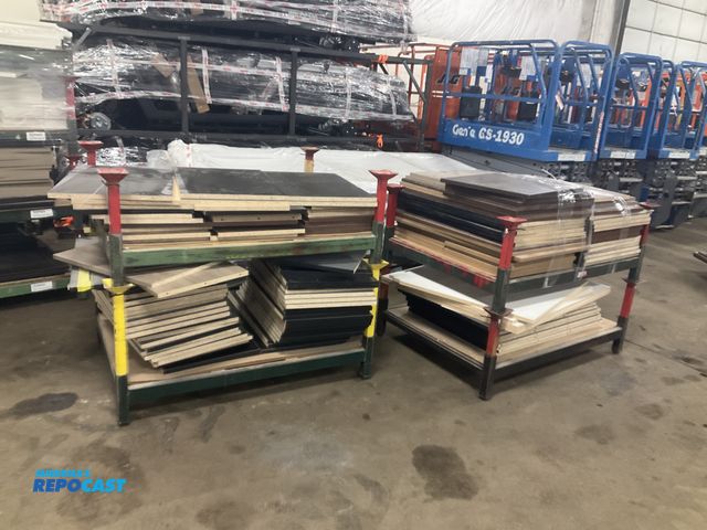 Lot 2-23731 - (4) stackable metal racks 35.5” x 48.5” full of misc wood cabinet panels and cabinet doors