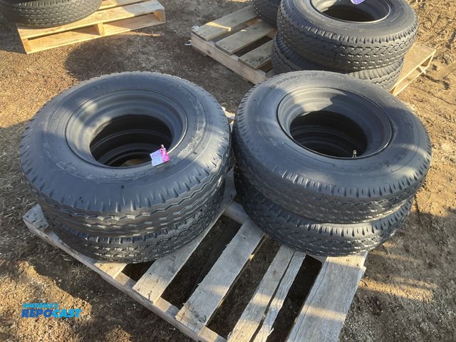 Lot 2-23681 - (4) 8-14.5 tires on steel mobile home style wheels, used