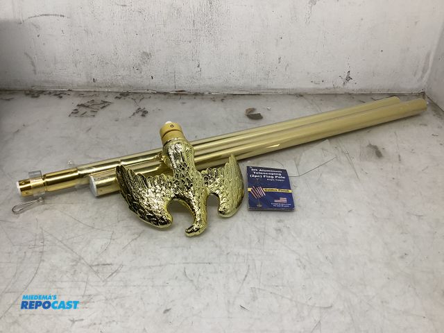 Lot 2-93501 - Light duty 8 Ft. Aluminum gold finish telescoping 2-piece flag pole with eagle topper.