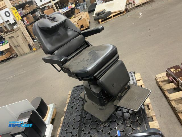 Lot 2-23803 - Black vinyl medical chair, has controls on the side
