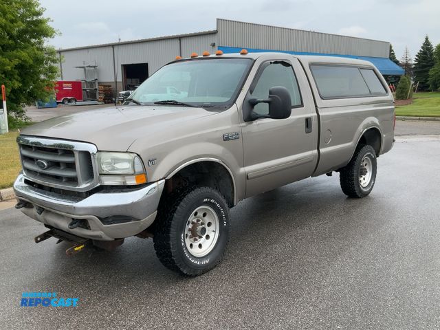 Lot 2-61757 - 2002 Ford SRW Super Duty Regular Cab Long Box Pickup Truck 4x4 Comes with 104”x27” Meyer plow and ex...