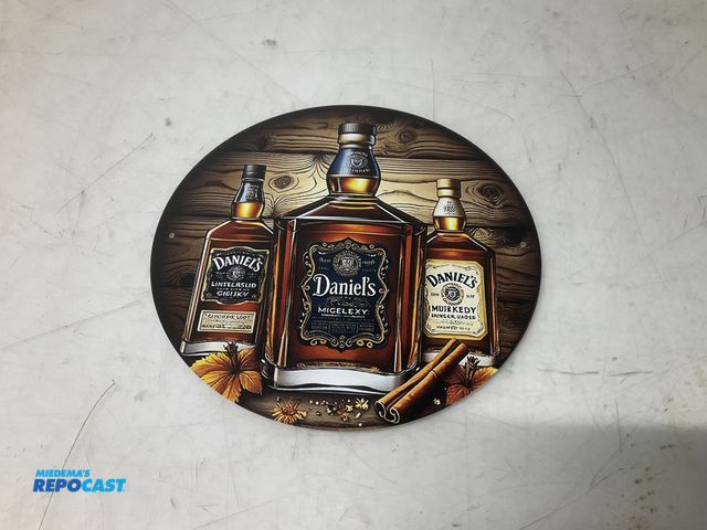 Lot 2-93890 - 8” Daniel’s circular metal sign