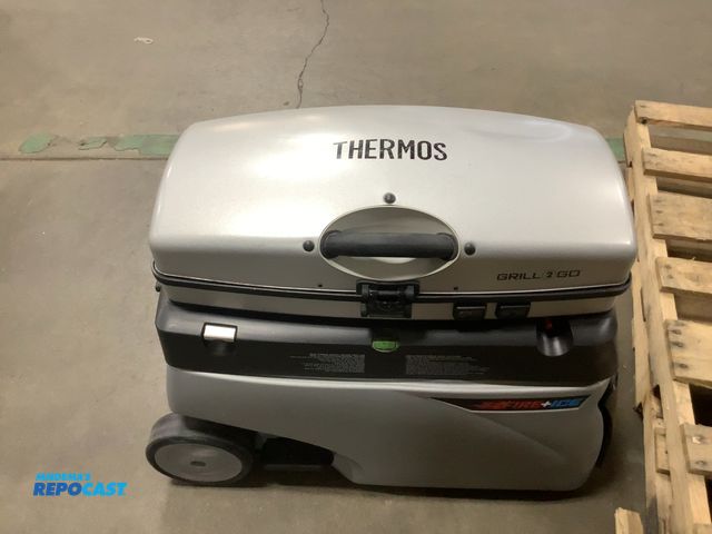 Lot 2-76782 - Thermos fire and ice cooler and grill 2 go 10 gal cooler on bottom with pop up grill and griddle on ...
