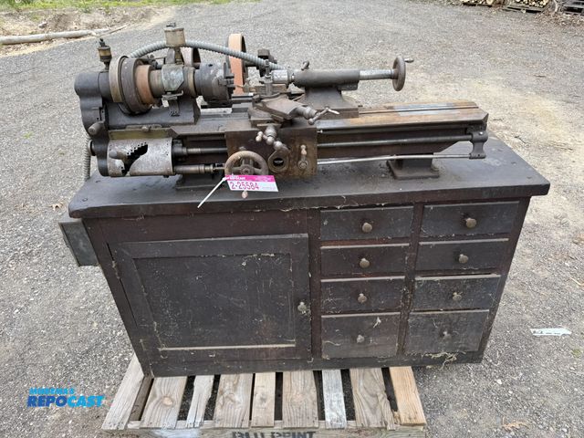 Lot 2-25584 - THE WADE AMERICAN TOOL CO. LATHE WITH VINTAGE WOOD CABINET &amp; SOME TOOLING IN DRAWERS. COMES WITH...