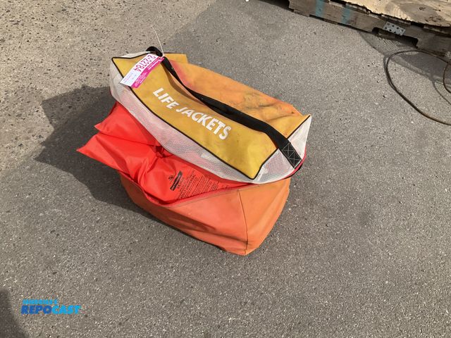 Lot 2-22784 - (4) Adult size life jackets with bag (zipper is broken)