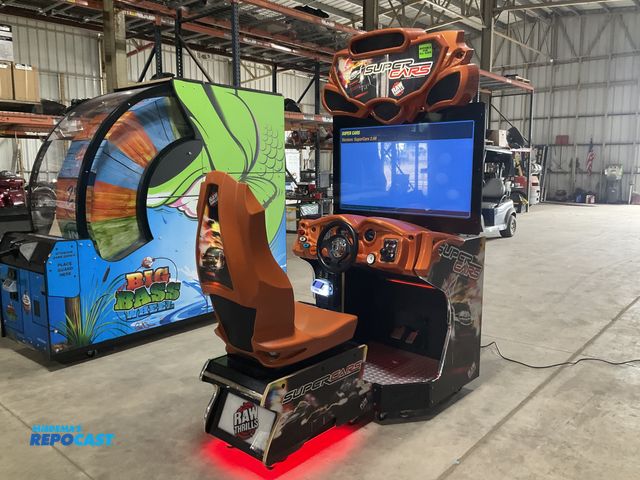 Lot 2-90906 - Raw Thrills Super Cars arcade driving game