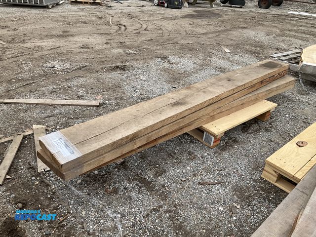 Lot 2-14691 - 4 Skid lot of various sized dark Wooden Boards 9’ x 10” x 2”