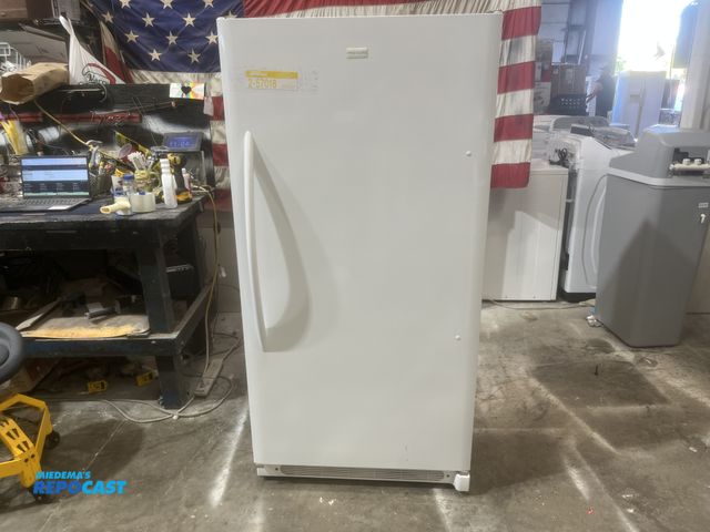 Lot 2-57018 - Frigidaire freezer Upright Freezer 4 shelves   pullout freezer basket     door storage