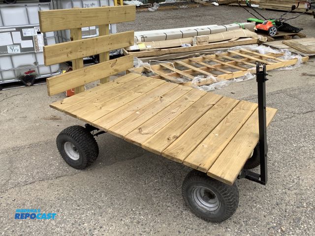 Lot 2-35021 - Wooden Mini Hay Wagon measuring 19” tall, and platform measures 56” x 39”.