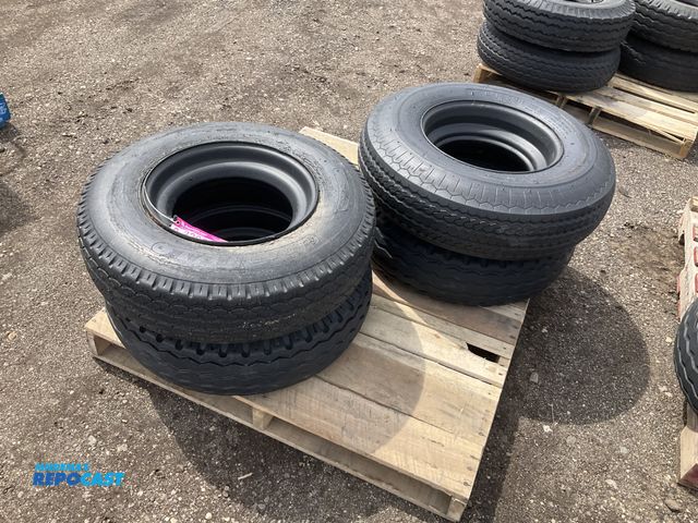 Lot 2-22931 - (4) 8-14.5 tires on steel mobile home style wheels, used