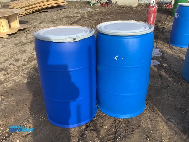 Lot 2-15239 - 2 55 gallon blue plastic barrels with removable lids and locking rings, clean inside, contained food...