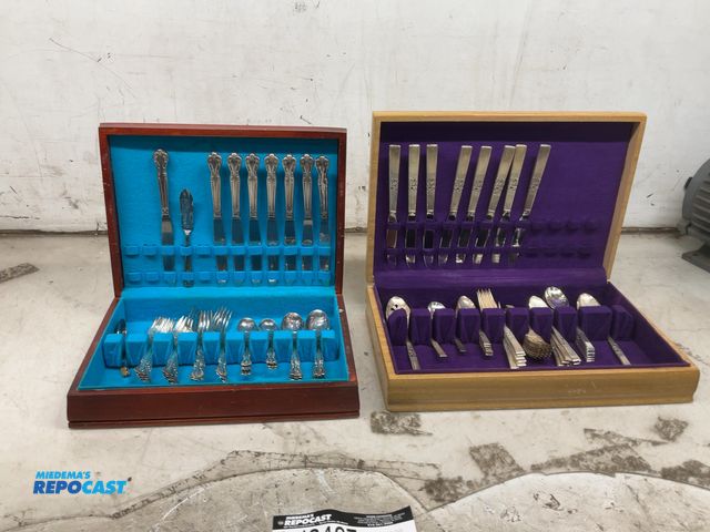 Lot 2-18427 - (2) Silverware sets: includes knives, forks, and spoons