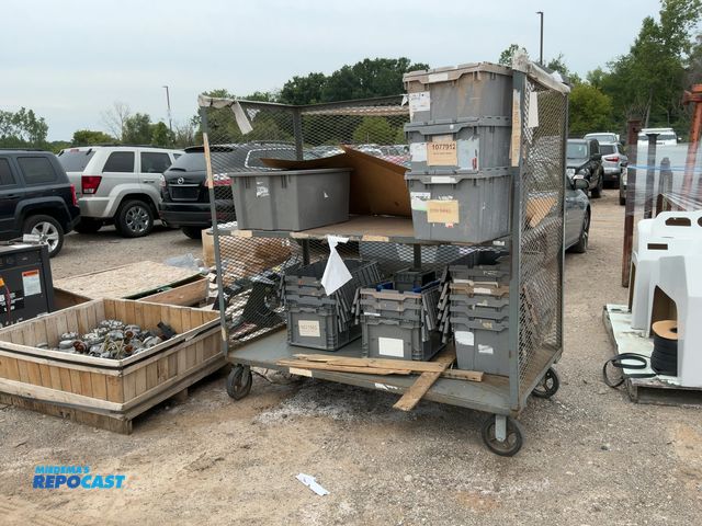 Lot 2-24702 - Large metal 2-shelf cart approx. 76”x36”x72” with various size plastic containers