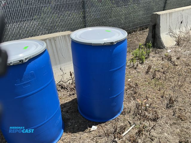 Lot 2-76868 - 1 55 gallon blue plastic barrel with removable lid and locking ring, contained a food product
