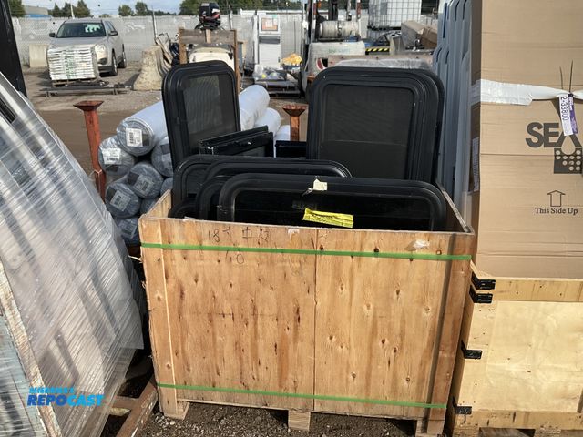 Lot 2-33699 - crate of asst. RV Windows