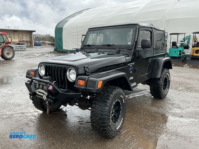 Lot 2-91600 - 1997 Jeep Wrangler Sport SUV 4x4