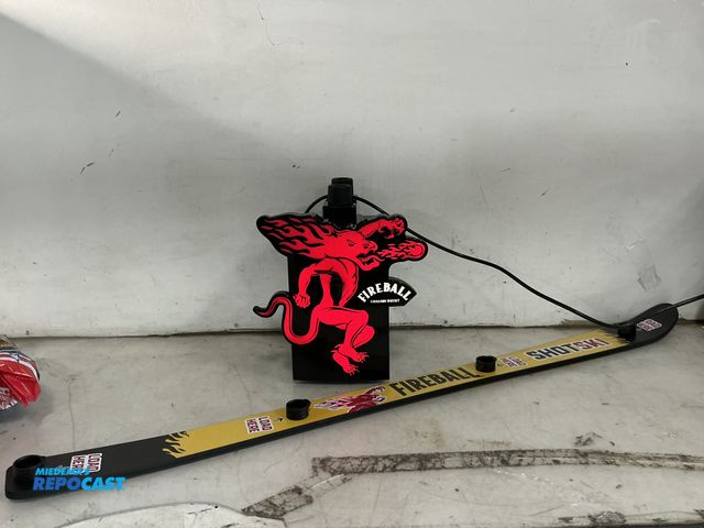 Lot 2-96765 - Fireball shot dispenser with bottle plugs in ports and fireball shot ski