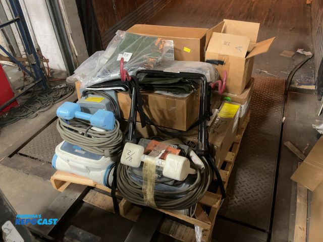 Lot 2-67261 - Skid of miscellaneous items. Includes blackout curtains, a bike rack, Aqua Bots, misc. hoses, motors...