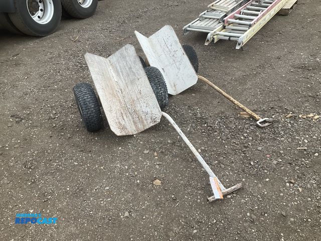 Lot 2-43715 - Pair of pipe transport dollies, 30” long trough with 12”T sides, pneumatic tires, used