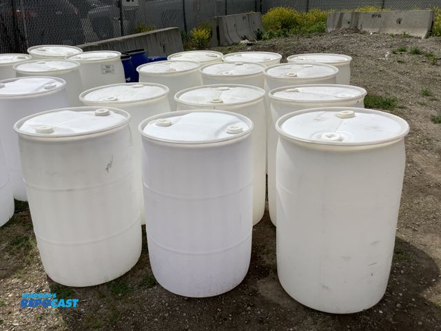 Lot 2-15591 - lot of 6 55 gallon white plastic barrels with 2 removable bungs, contained mineral oil