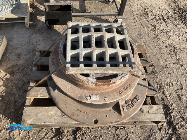 Lot 2-19834 - Skid lot of heavy duty cast iron manhole frame and gate 1120 Z
