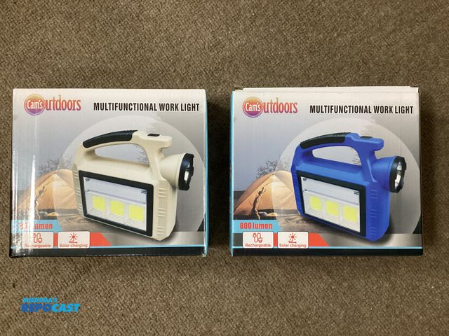 Lot 2-36636 - Two new Cam’s Outdoors multifunctional work light. 800 lumens, rechargeable, solar charging. One blu...
