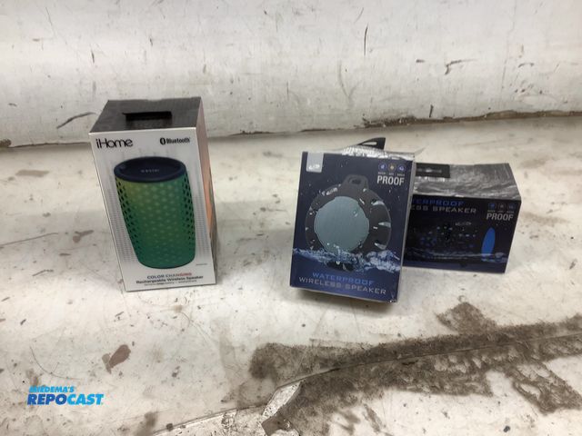 Lot 2-92585 - Lot of speakers including a  round I live waterproof wireless speaker, and a cylinder I live waterpr...