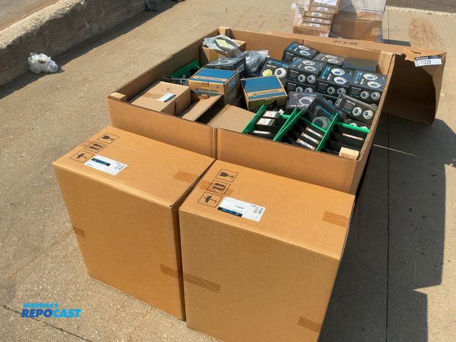 Lot 2-11228 - Skid of Assorted New Automann Semi Truck Parts includes Hub Caps, Coolant Sensors, Pressure Sensors,...